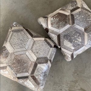 A Pair of calf hair cowhide patchwork pillows